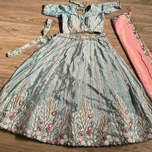 New Elegant Floral Embroidered  Chaniya Choli  Dress in Blue and Pink color.